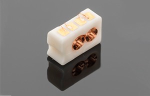 Micro-injection molded ceramic coil assembly